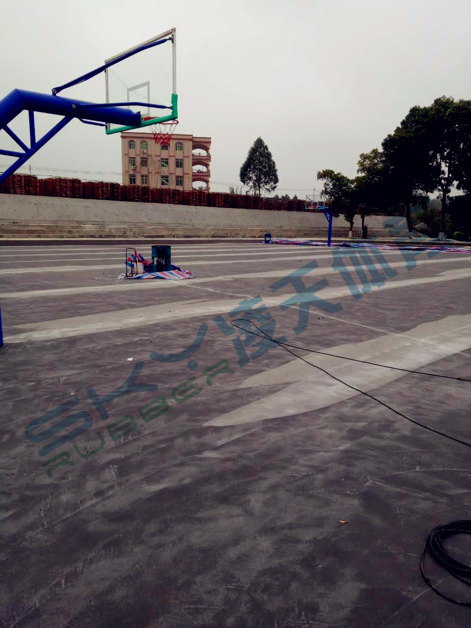 丙烯酸蓝球场案例：江门市鹤山宅梧小学弹性丙